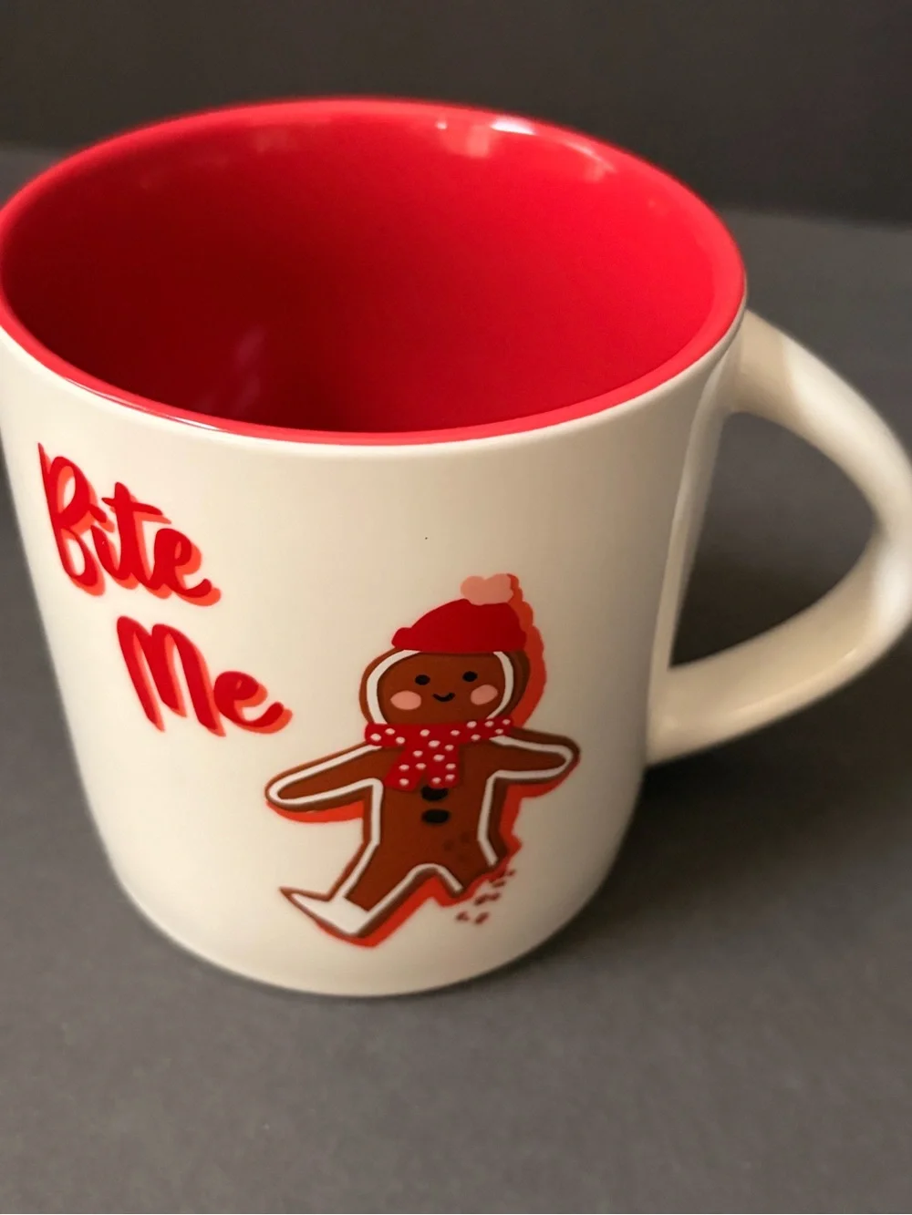 White Ceramic Mug with Red Interior and Gingerbread Graphic